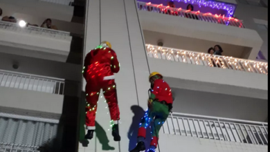 Photo of Papai Noel desce de rapel de torre residencial no Parque Verde, em Belém